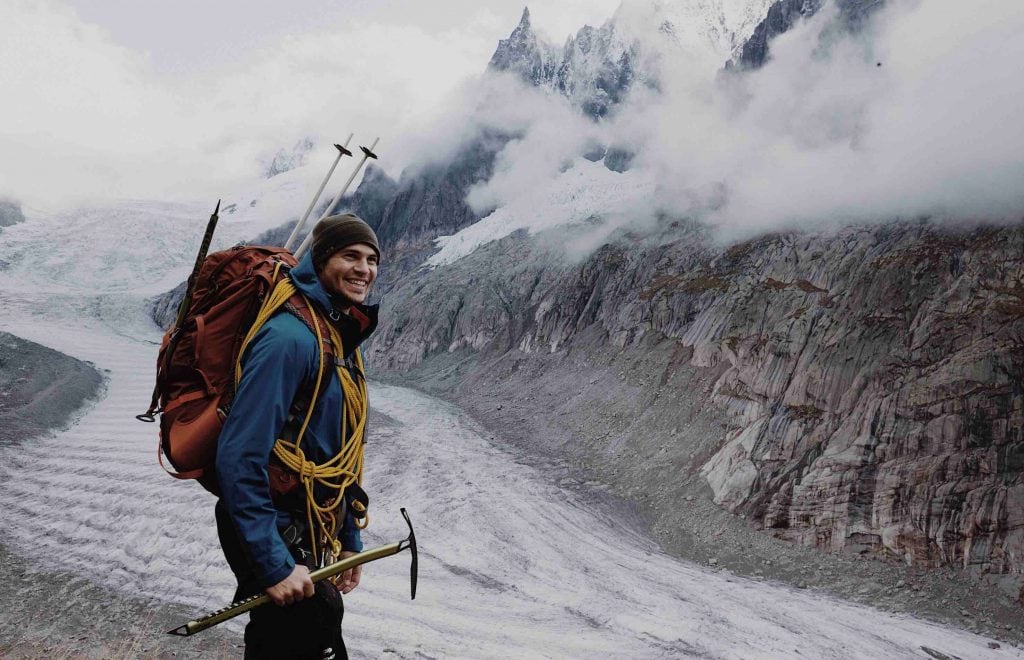 A Man Relaxs in Hiking Trail with Pole