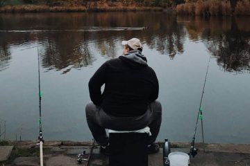 A Man is Fishing by two Lightweight Trout Rods