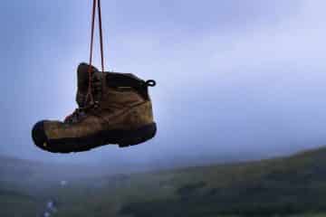 One Size Bigger Hiking Boot is Hanging