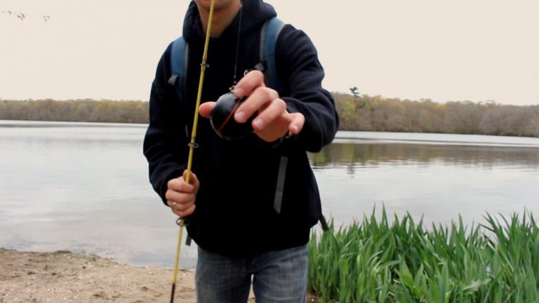 A Angler Uses Deeper Fish Finder from the Shore