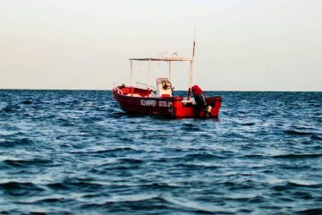 an offshore fishing boat with handheld GPS
